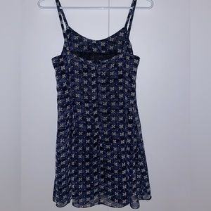 Pretty Blue flower patterned dress with thin straps.